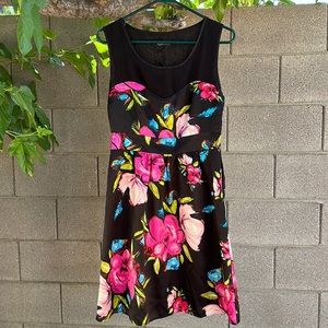 Floral dress with sheer sweetheart neck detail.